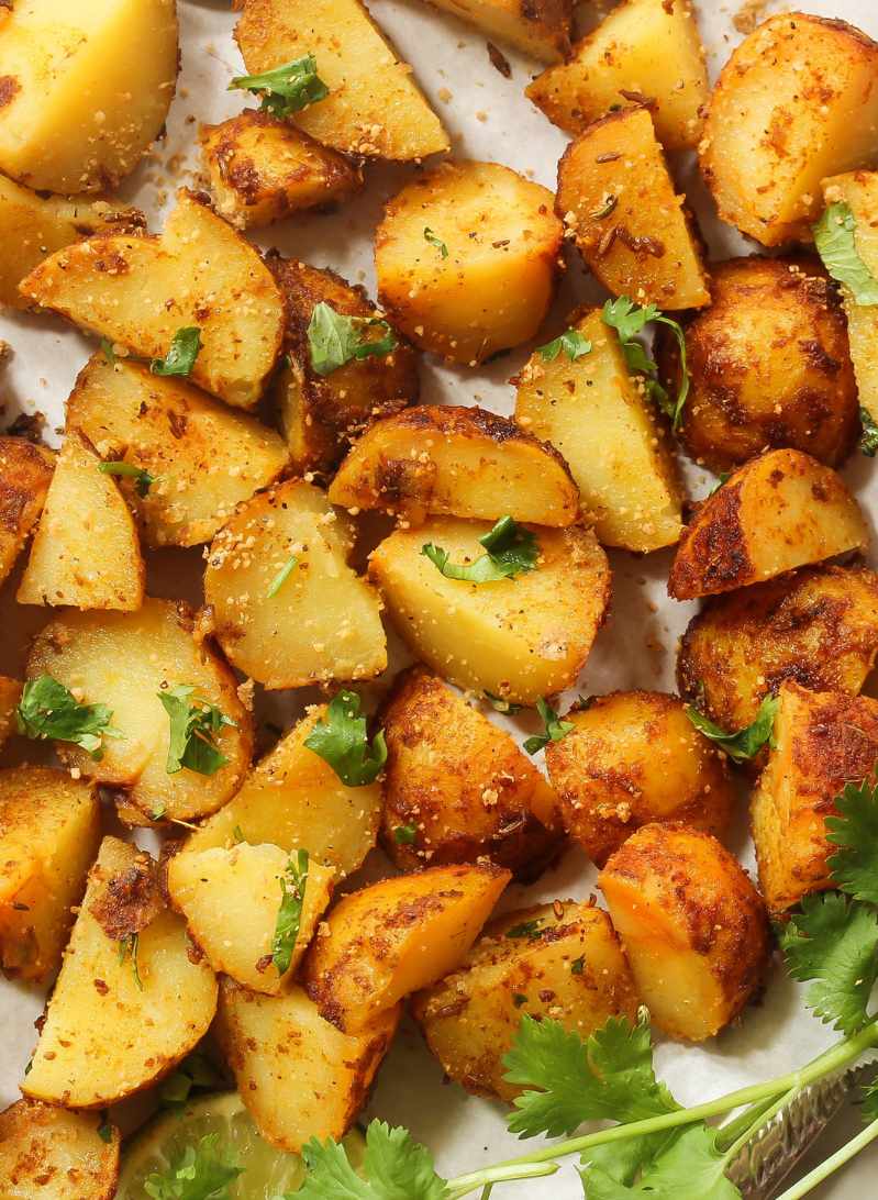 Garlic roasted potatoes garnished with chopped flatleaf parsley.