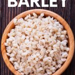 Overhead of cooked barley grains in a wooden bowl. A text overlay reads, "How to Cook Barley. Instant Pot. Stovetop."