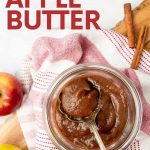 A spoon scoops homemade apple butter from a jar. A text overlay reads, "Instant Pot Apple Butter."