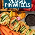 A colorful pinwheels lunch in a metal lunchbox with three sections. A text overlay reads, "Hummus Veggie Pinwheels."